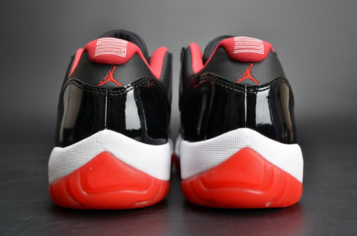 air jordan 11 retro low "bred" black/ red mens 528895-012